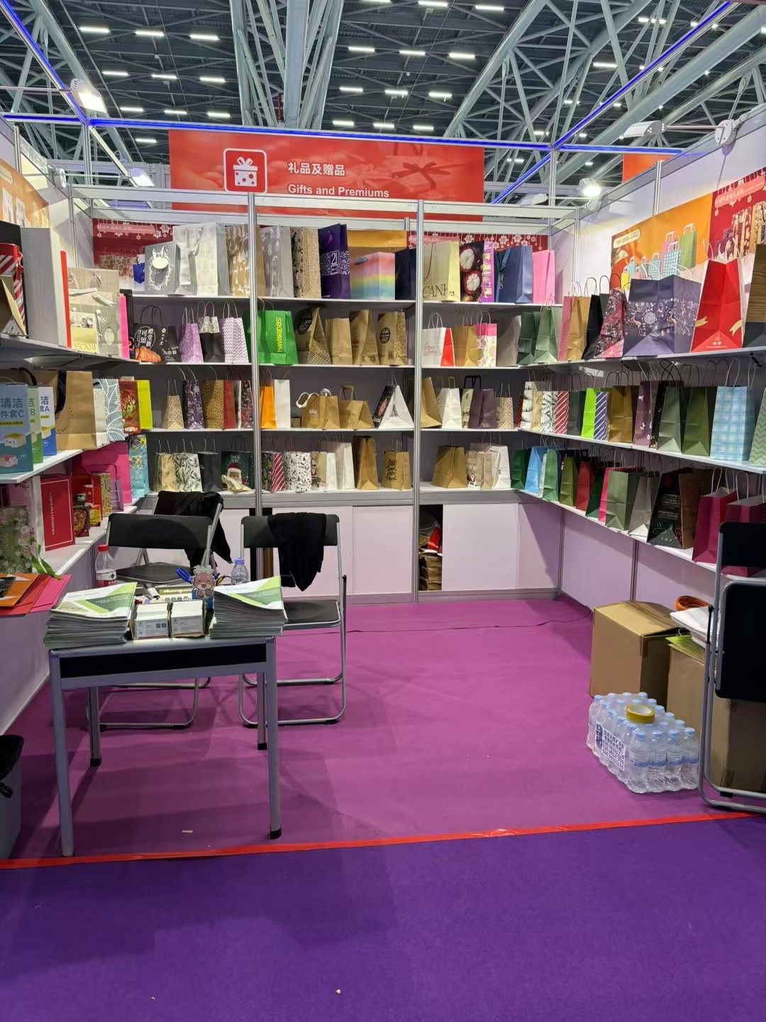 Mixed custom packaging samples displayed at an exhibition booth