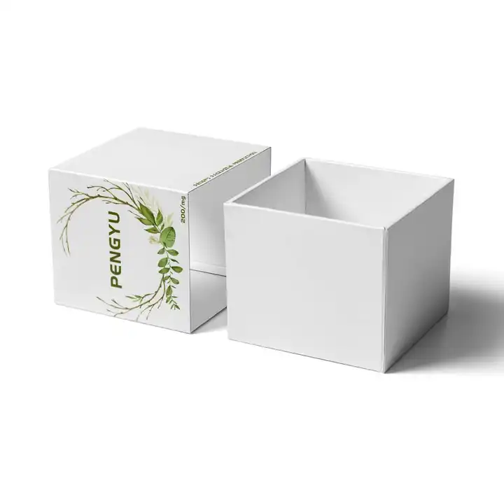White lift-off lid presentation box with botanical printing, shown open beside its lid