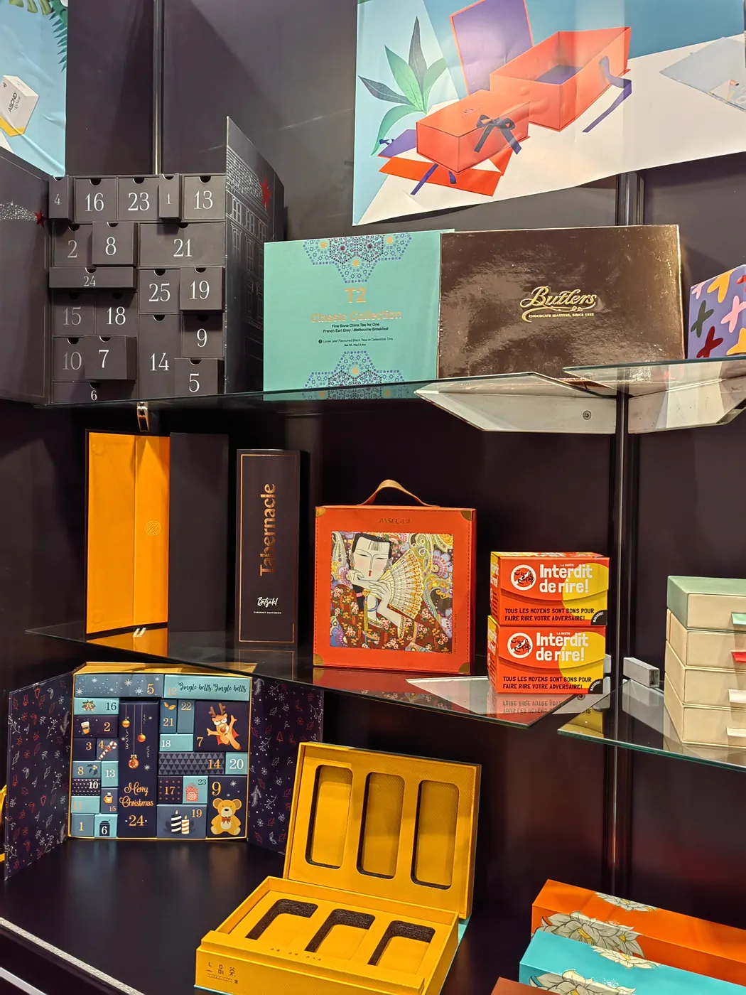 Drawer boxes and printed gift box samples displayed at a packaging trade show