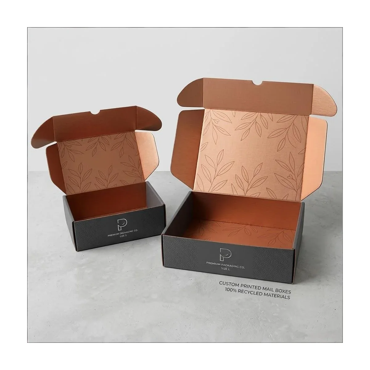 Two open corrugated mailer boxes with printed interiors