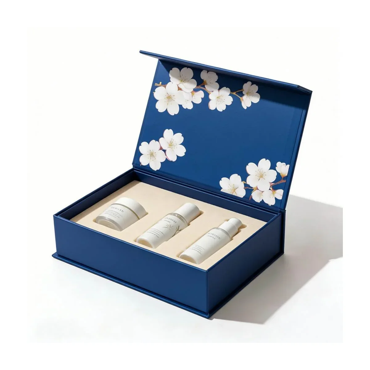 Open blue magnetic rigid box with a flocked blister insert
