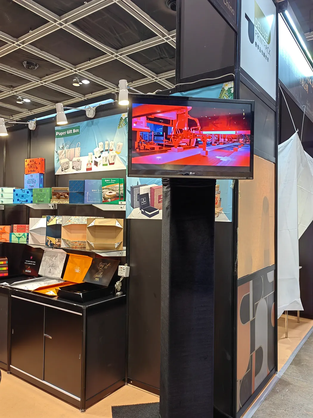 XLY exhibition booth with custom packaging box and bag samples