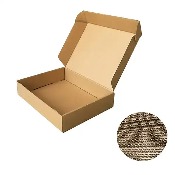 Open kraft corrugated mailer showing folded flaps and board structure