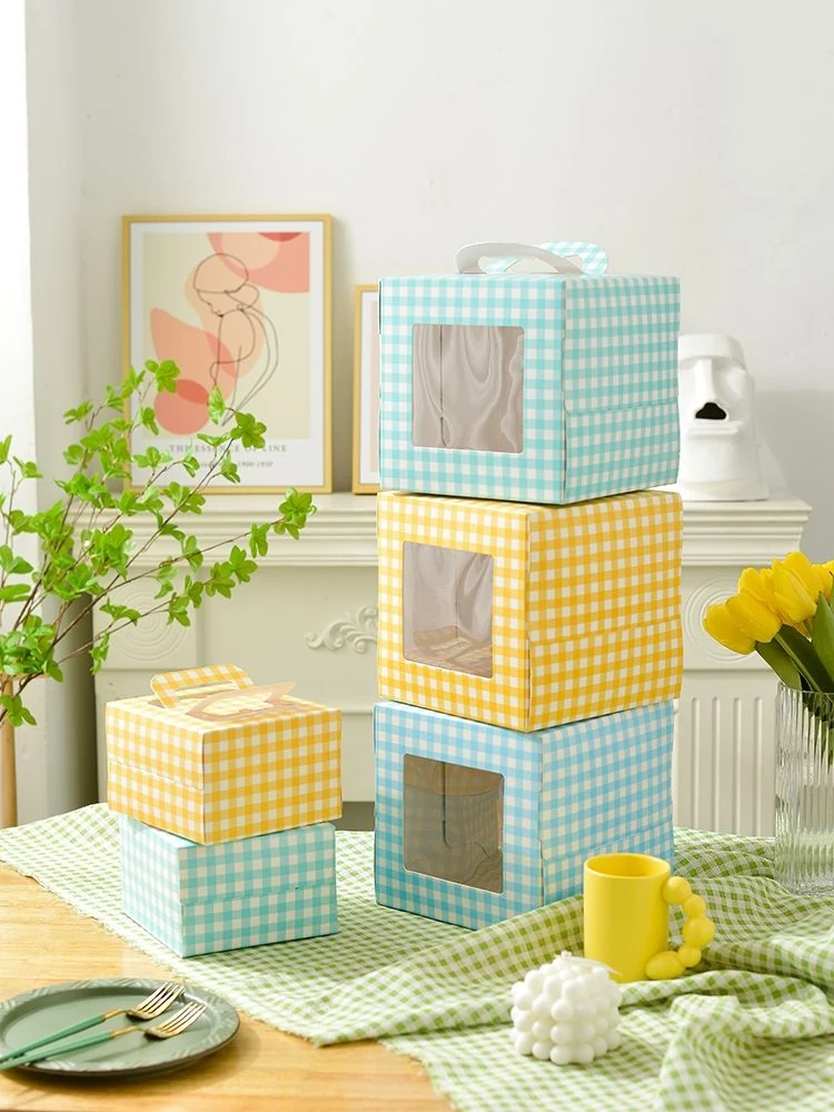 Gingham-print cake carry cartons with viewing windows