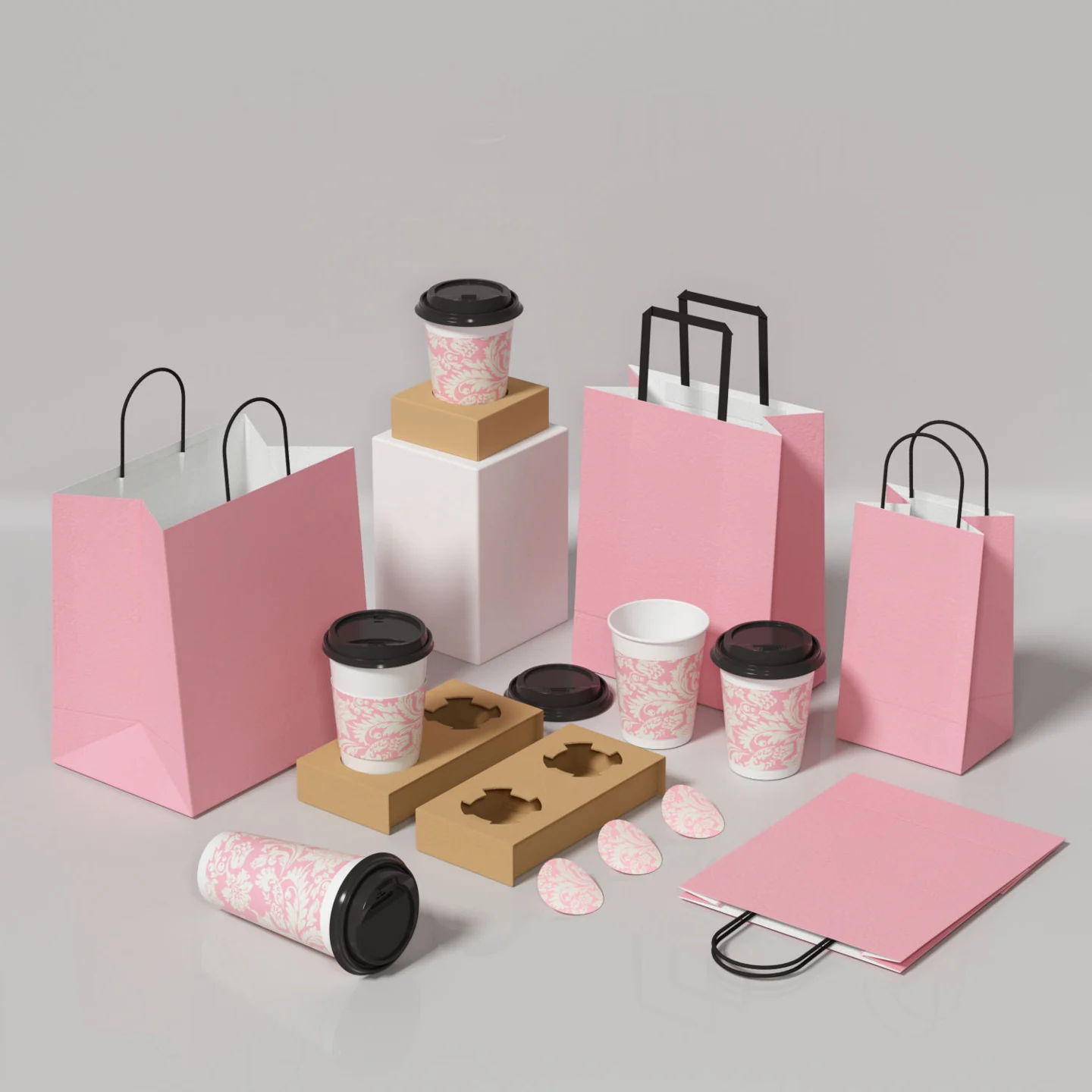 Pink paper shopping bags with black handles displayed with matching takeaway coffee cups and lids