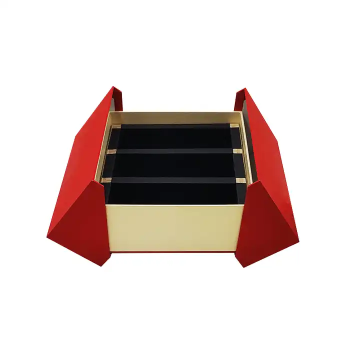 Red presentation box opened to show a divided interior for bottle packing review