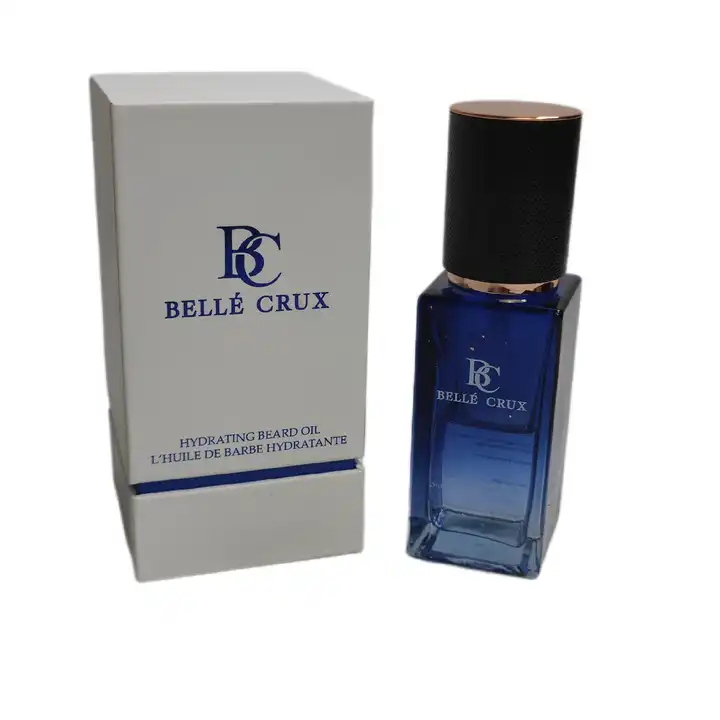 Rectangular cosmetic bottle beside its matching printed folding carton