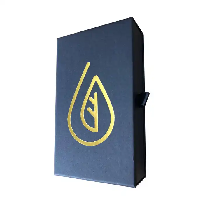 Closed dark drawer-style rigid box with a black ribbon pull