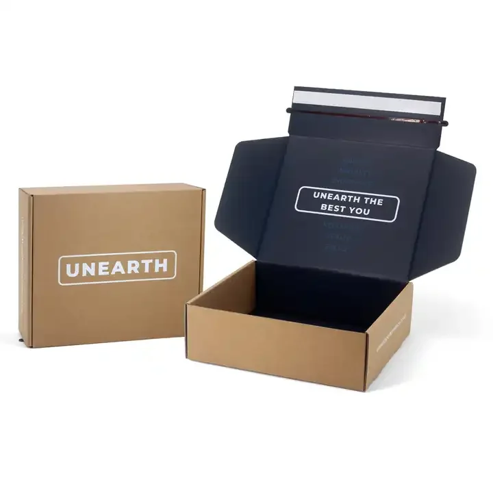 Kraft and navy printed mailer boxes shown open and closed